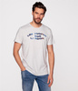 T-shirt regular z brandowanym nadrukiem COLOUR 4303 DAWN BLUE
